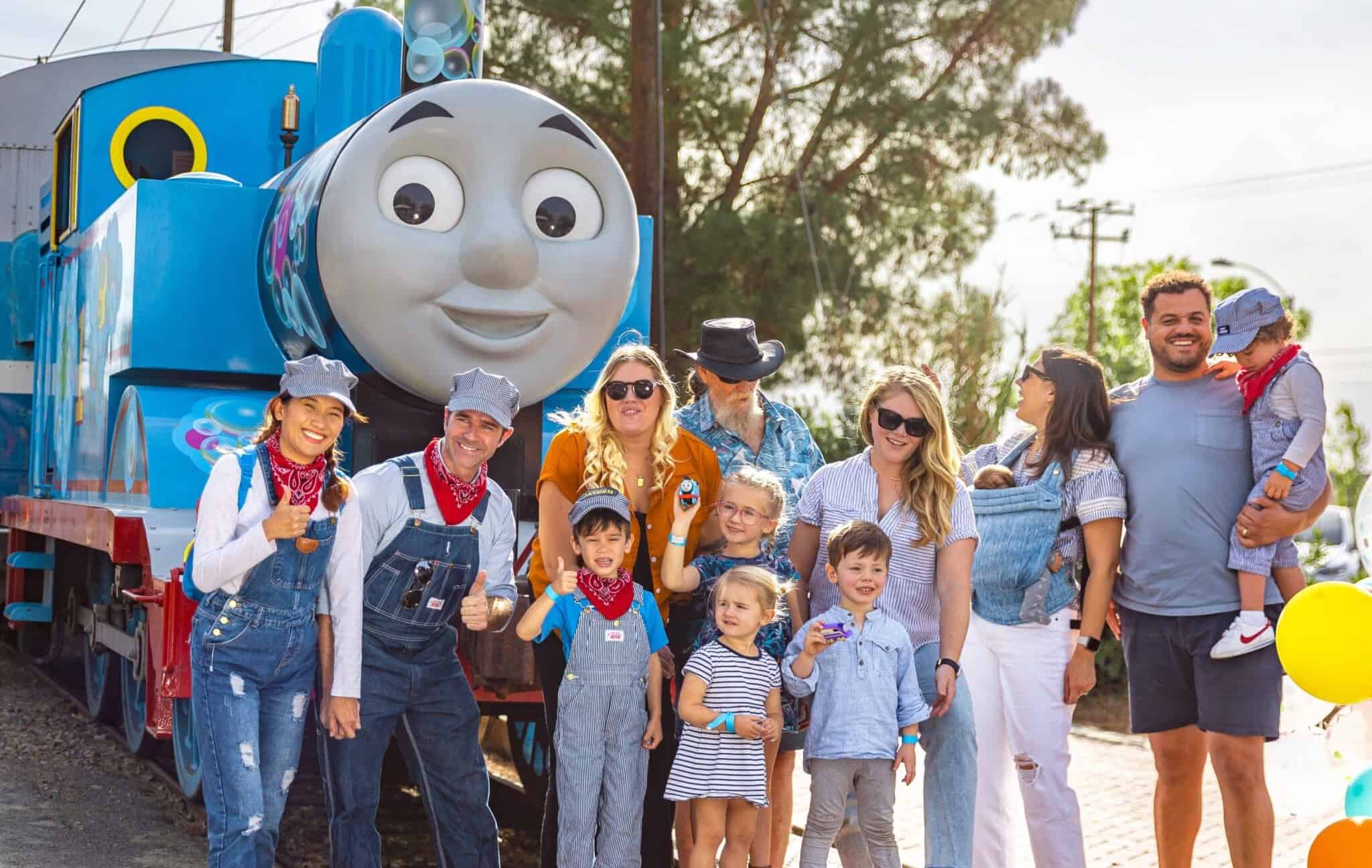 Group of passengers standing with Thomas